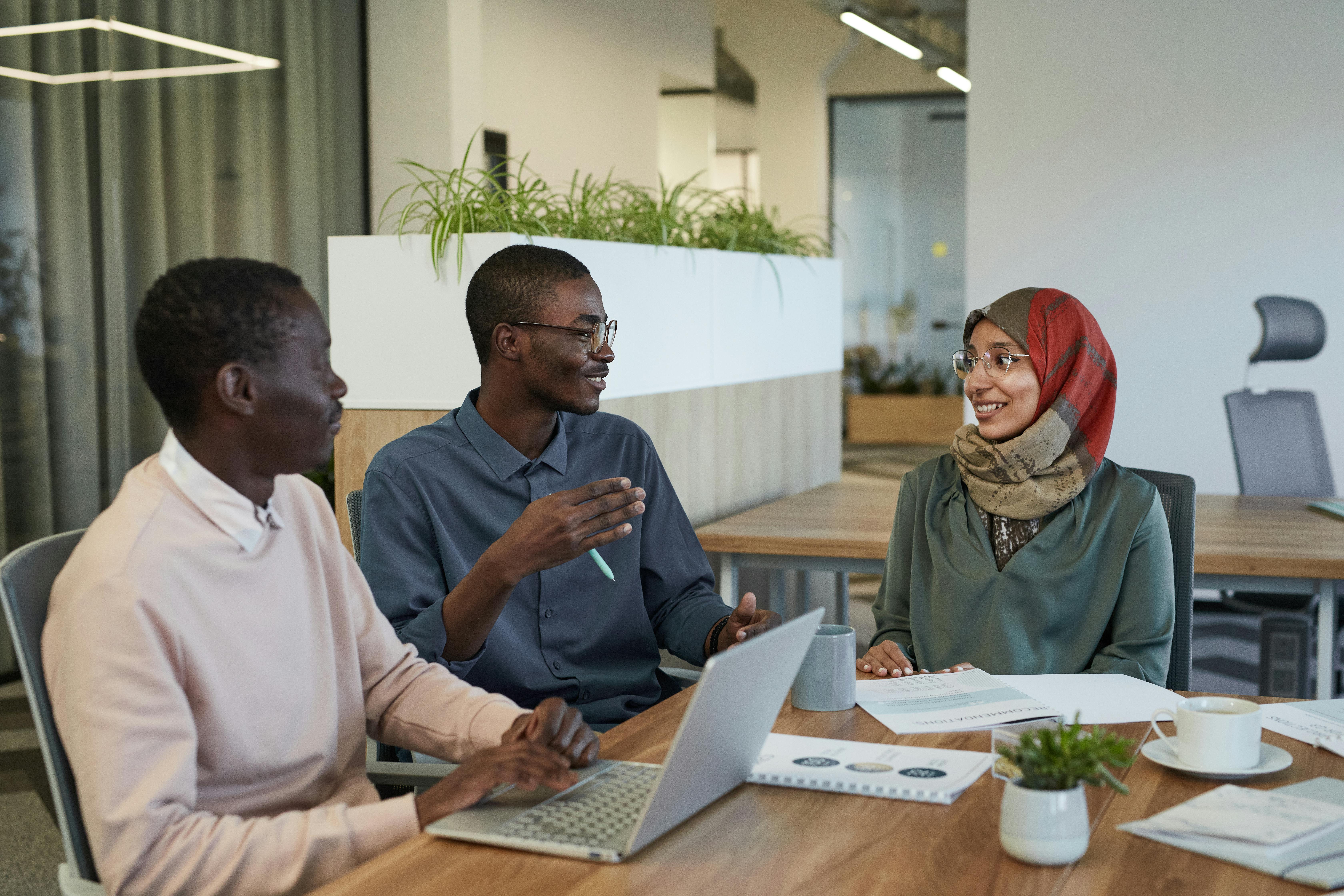 Team collaboration in modern office workspace